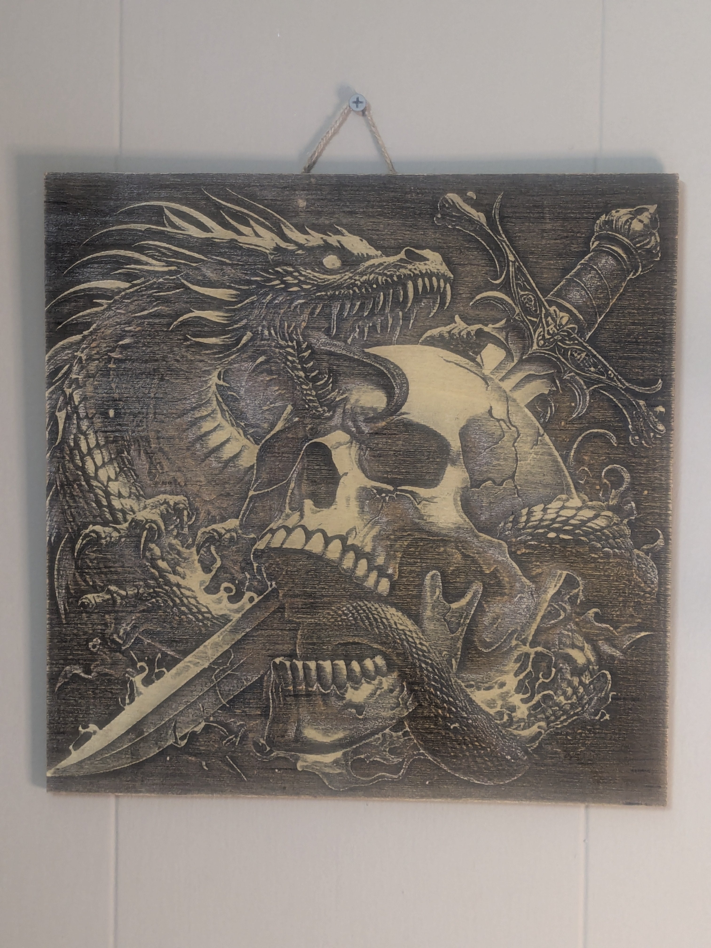 The Wyrm’s Relic – Dragon & Skull Wood-Burned Art